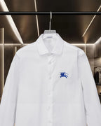 White Burberry button-up shirt with blue horse logo on chest