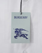Burberry clothing tag with blue equestrian rider logo