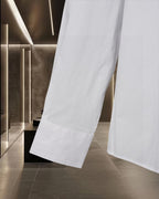 White long-sleeve dress shirt with straight hem