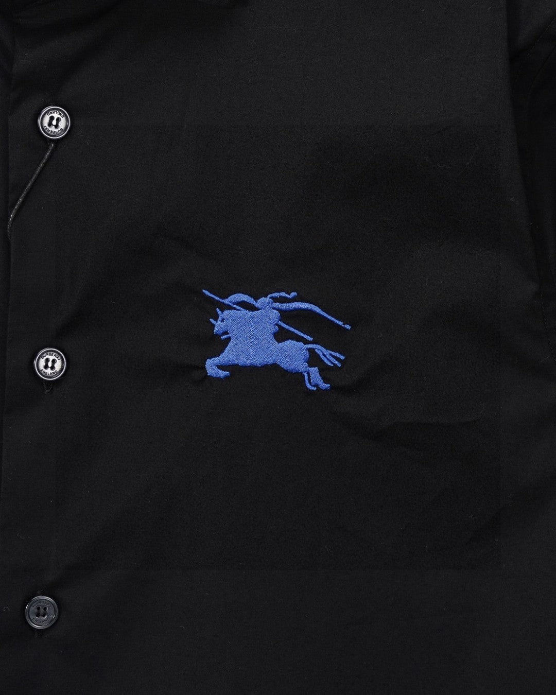 Burberry long-sleeve button-up shirt with blue horse logo and dark buttons