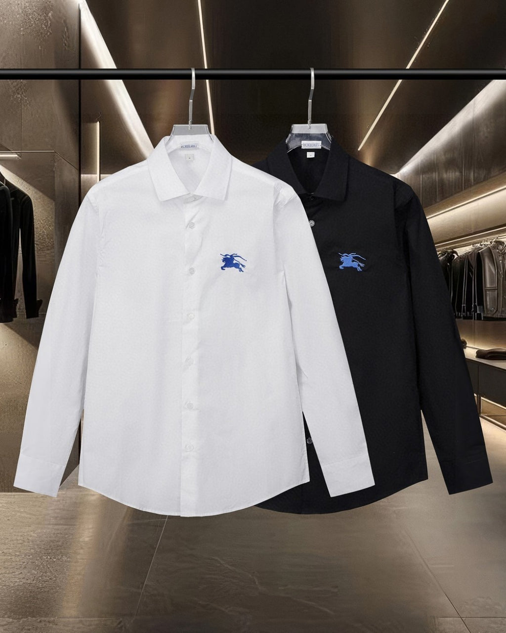 Long-sleeve button-up shirt, white and black with blue logo, front view