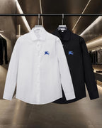 Long-sleeve button-up shirt, white and black with blue logo, front view