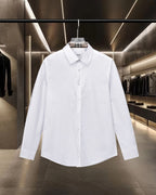 White Burberry long-sleeve dress shirt with button-front and pointed collar