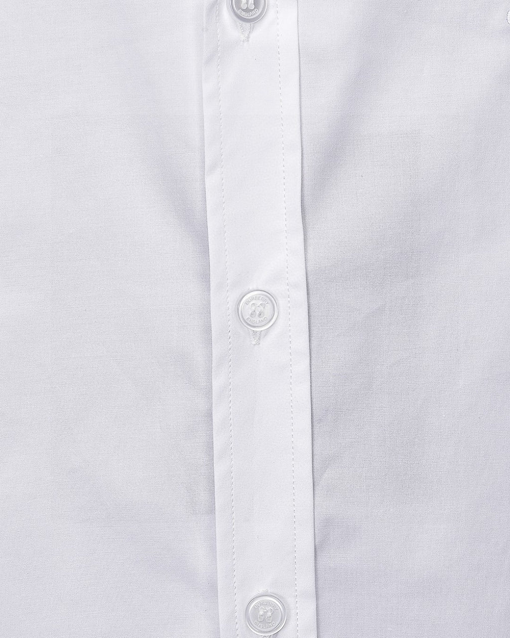 White Burberry dress shirt front placket detail with buttons