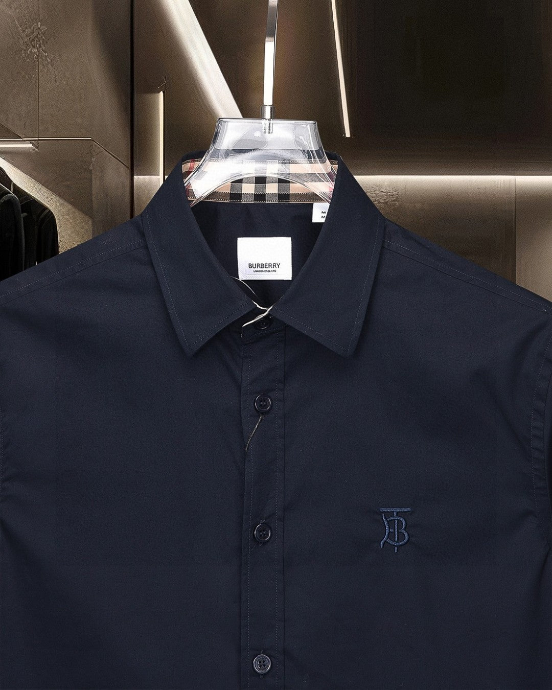Navy Burberry button-up shirt with check inner collar and chest logo