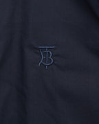 Navy Burberry TB logo embroidery on chest of button-up shirt