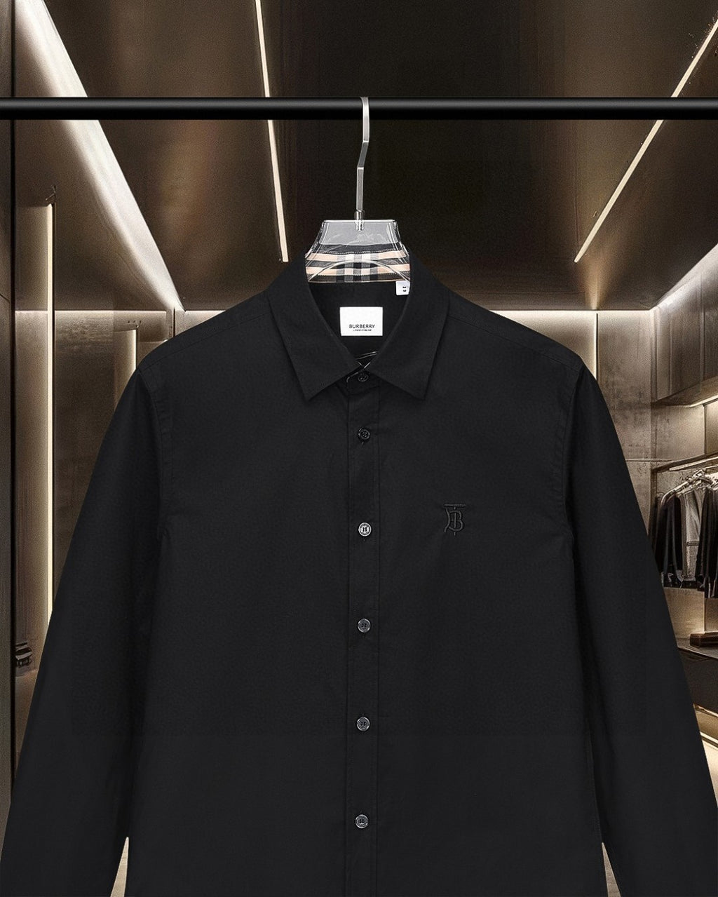 Burberry long-sleeve button-up shirt, front view with point collar and buttons