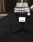 Burberry button-up shirt close-up of collar and branded inner label