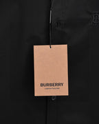 Burberry dark button-up shirt with hanging brand tag