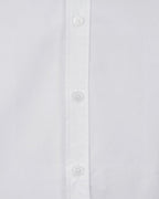 White long-sleeve button-up shirt cuff with button placket detail
