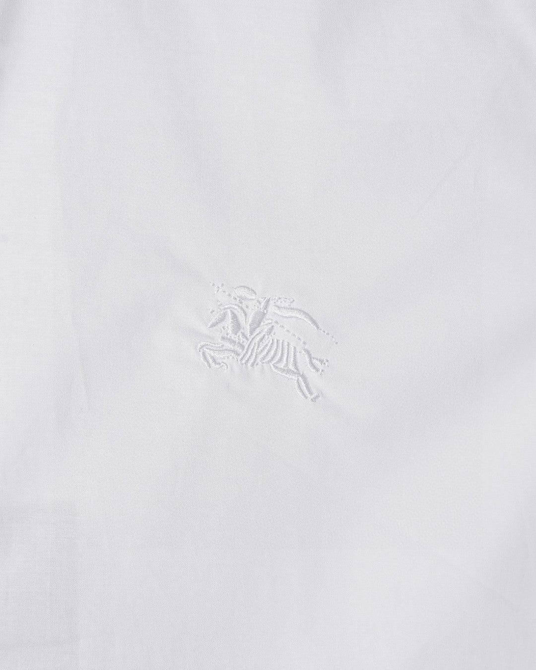 White long-sleeve button-up shirt with embroidered horse logo