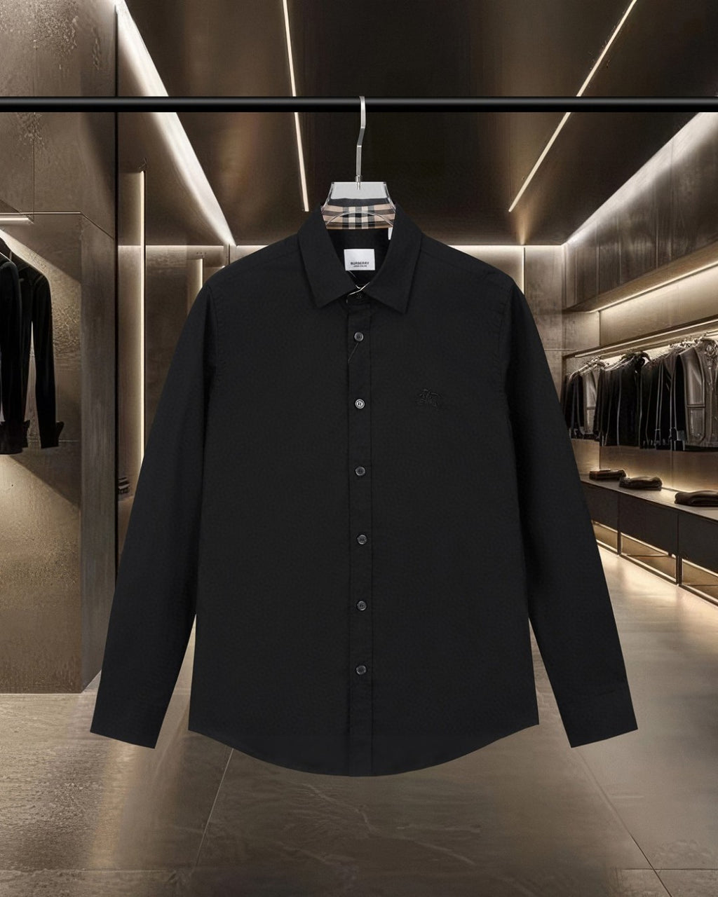 Black long-sleeve button-up shirt with pointed collar and front button placket