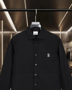 Burberry long-sleeve shirt front, button placket, chest TB logo, dark black