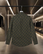 Plaid button-up shirt back view with long sleeves, dark green and yellow grid pattern