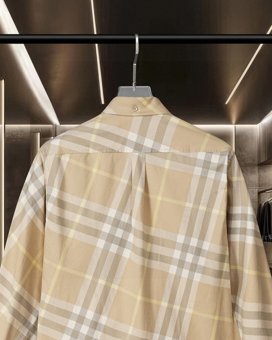 Long-sleeve button-up shirt in beige plaid, back view with pleat detail