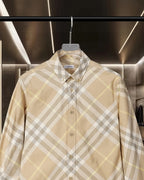 Long-sleeve button-up shirt in beige plaid with logo at collar