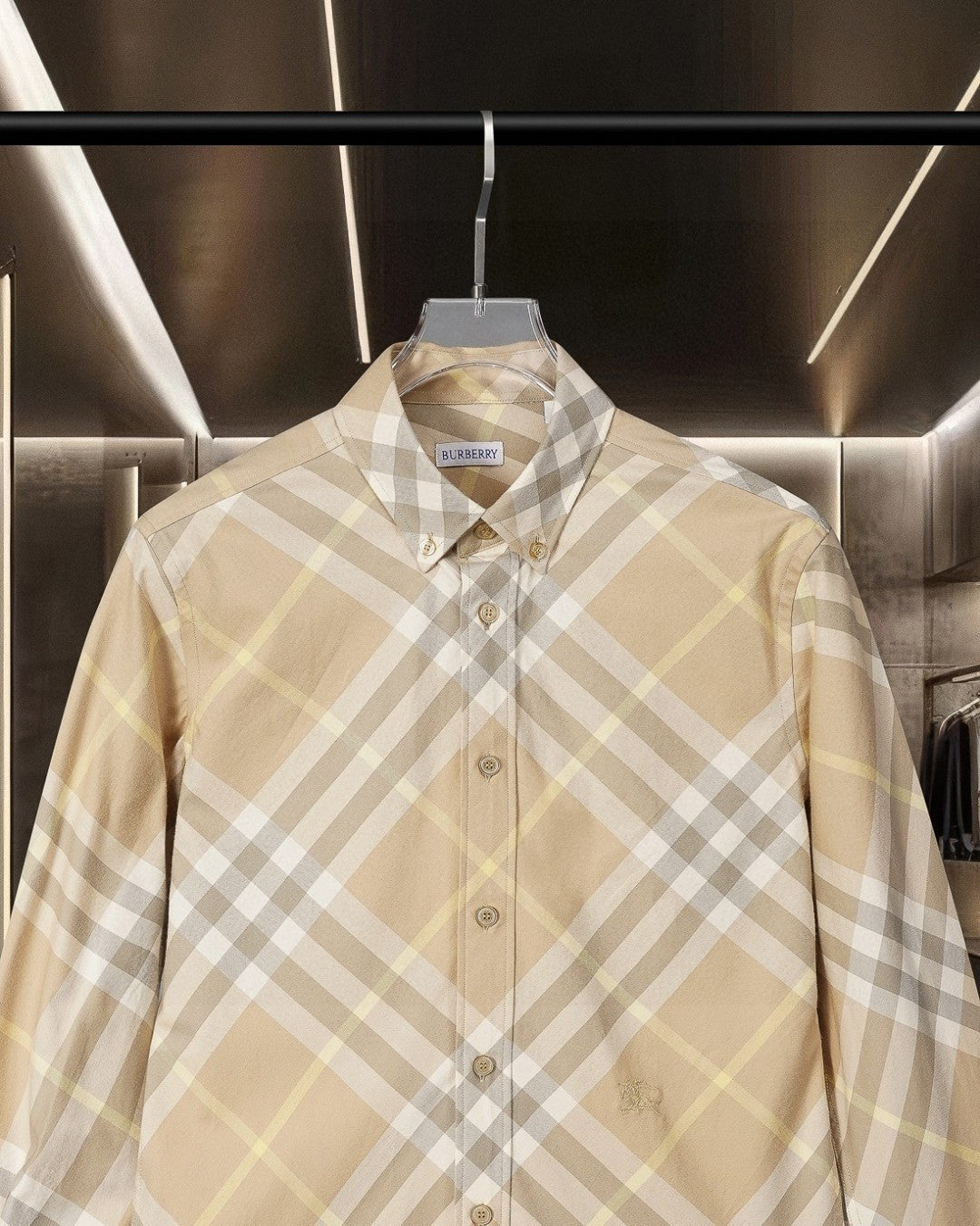 Long-sleeve button-up shirt in beige plaid with logo at collar