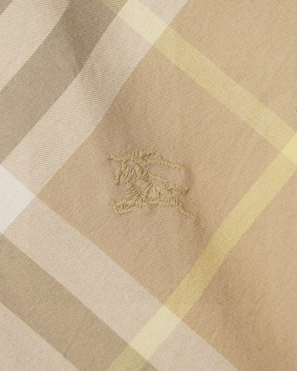 Long-sleeve shirt fabric in beige plaid with small embroidered mark