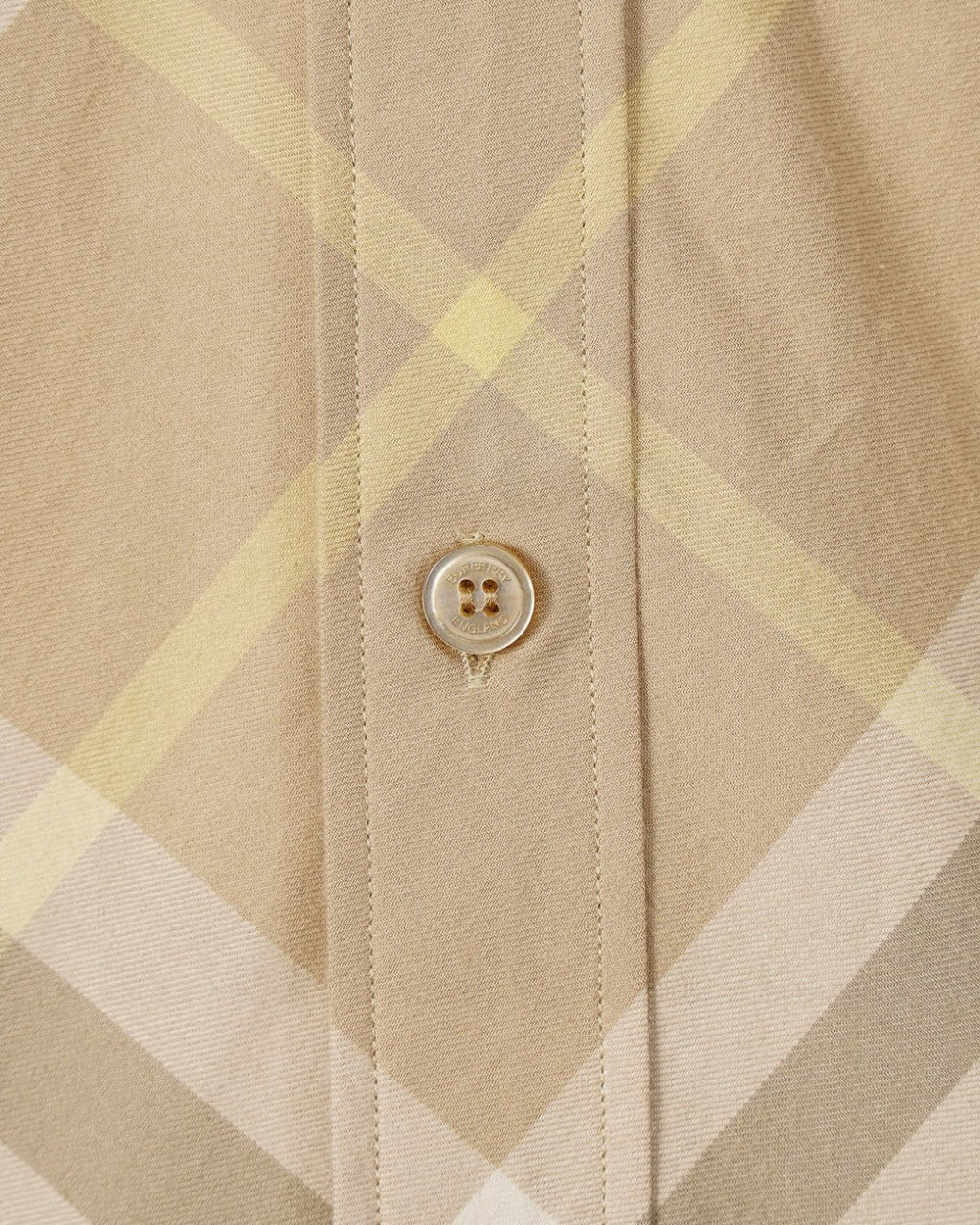 Long-sleeve shirt in beige plaid with buttoned placket and collar seam