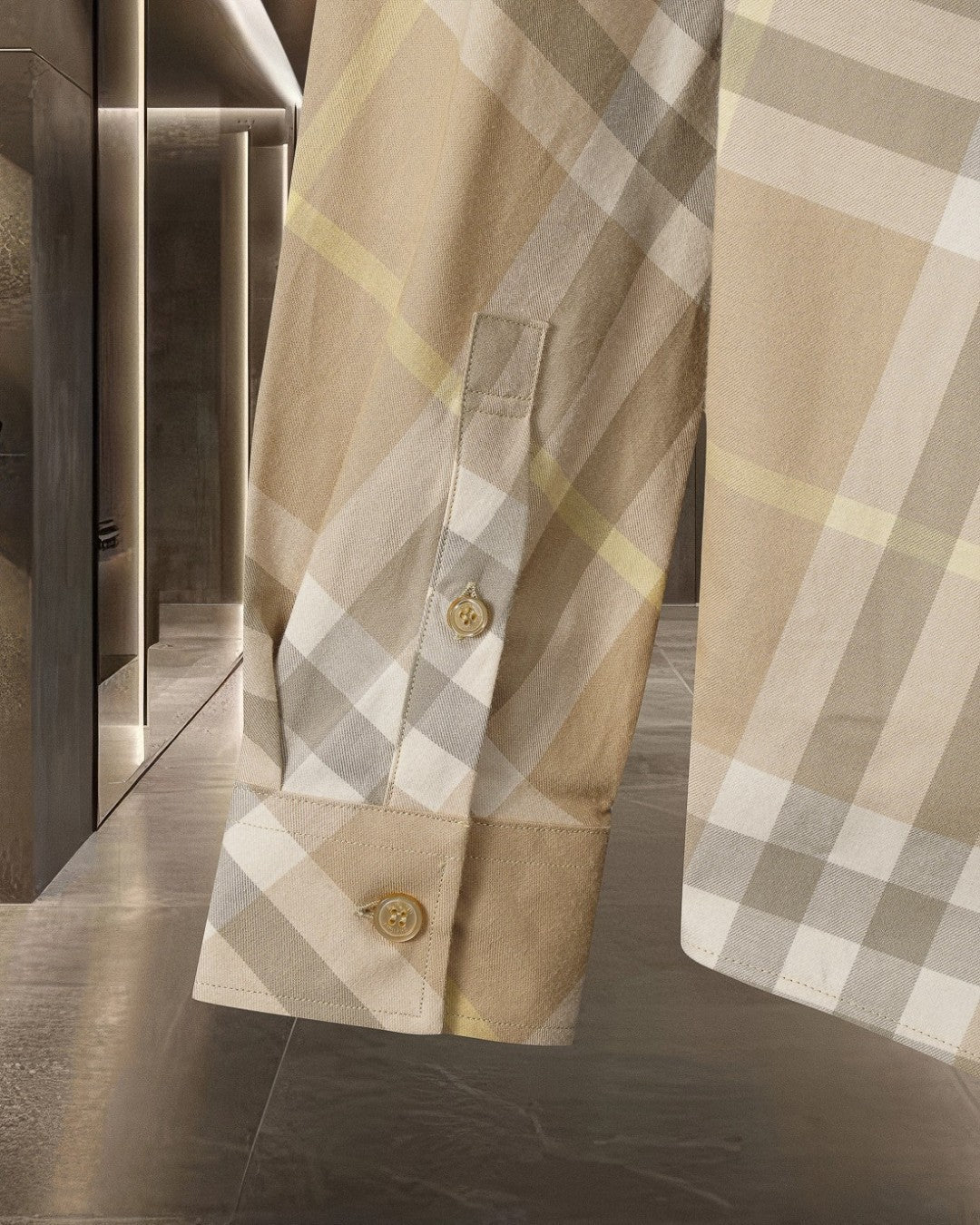 Beige plaid long-sleeve button-up shirt with gold button detail