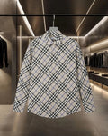 Long-sleeve button-up check shirt, white with black and blue plaid