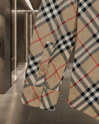 Burberry plaid long-sleeve shirt cuff with buttoned sleeve placket