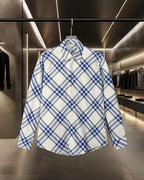 Long-sleeve plaid shirt with pointed collar and button front, blue and white