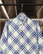 Burberry long-sleeve plaid shirt close-up: pointed collar and button placket