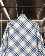 Long-sleeve plaid shirt back view close-up, blue and white check pattern