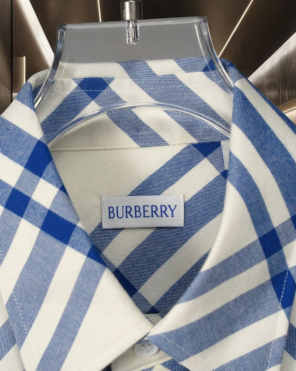 Burberry plaid shirt chest tag on collar, blue-and-white check pattern