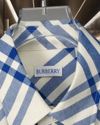 Burberry plaid shirt chest tag on collar, blue-and-white check pattern