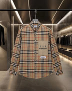 Long-sleeve plaid button-up shirt with chest patch pocket and front buttons