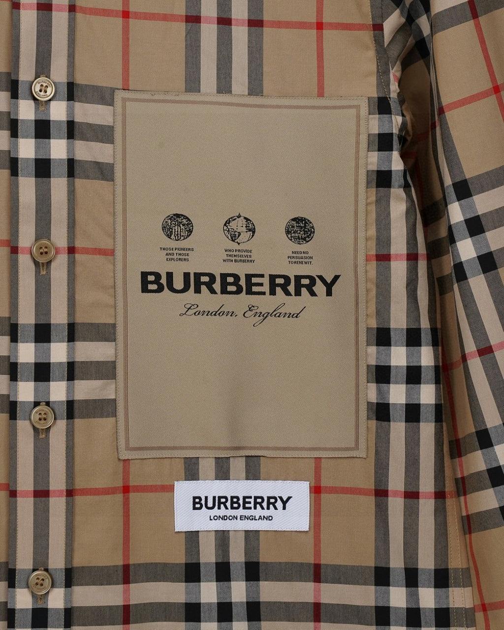Plaid button-up shirt with beige Burberry logo label on chest pocket