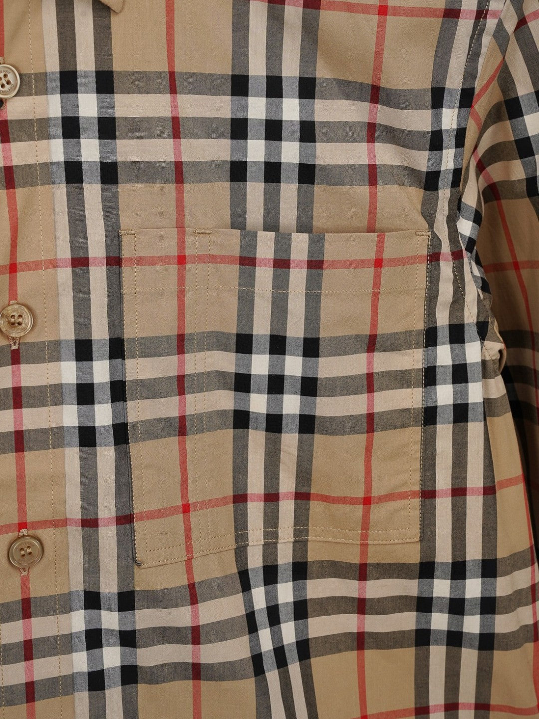 Burberry plaid button-up shirt pocket detail with buttons