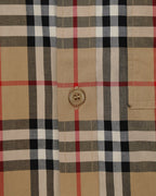 Burberry plaid button-up shirt front with logo button and check pattern