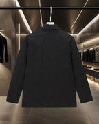 Burberry long coat in black with back button placket and full-length sleeves