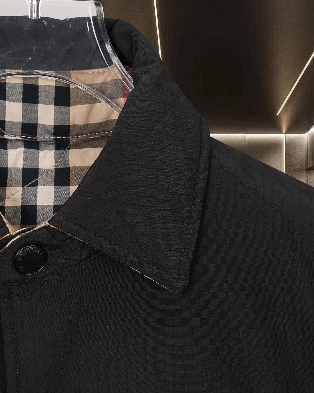 Burberry long coat sleeve cuff detail with black fabric and plaid inner collar