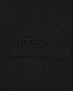 Burberry long coat pocket logo embroidery 'BURBERRY' on black fabric