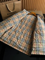 Long jacket with plaid lining and button-front placket, shown laid open