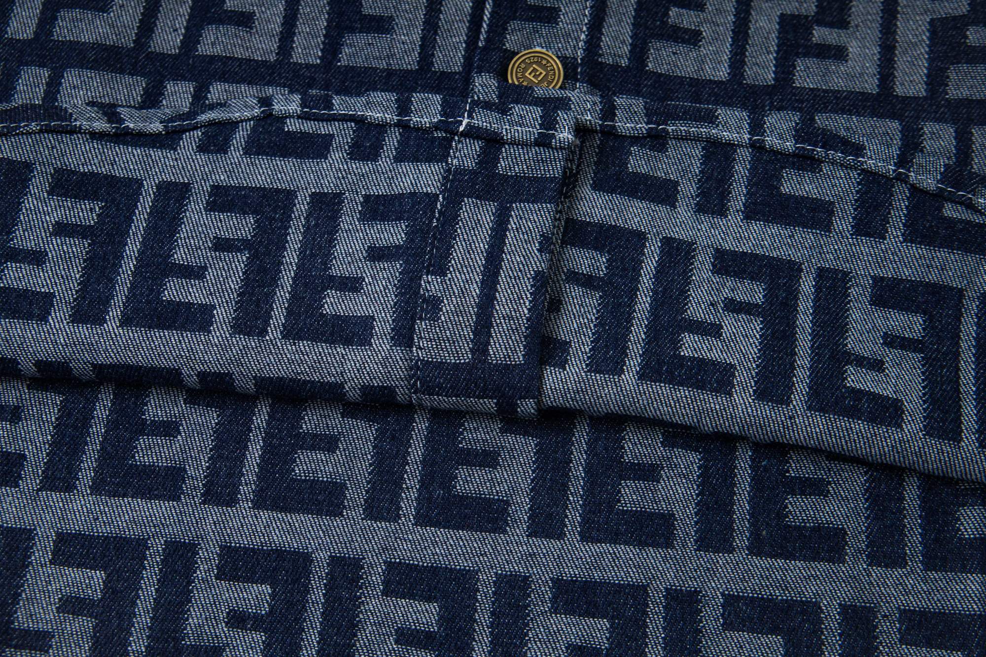 Fendi long-sleeve shirt seam detail on navy and light blue FF monogram fabric