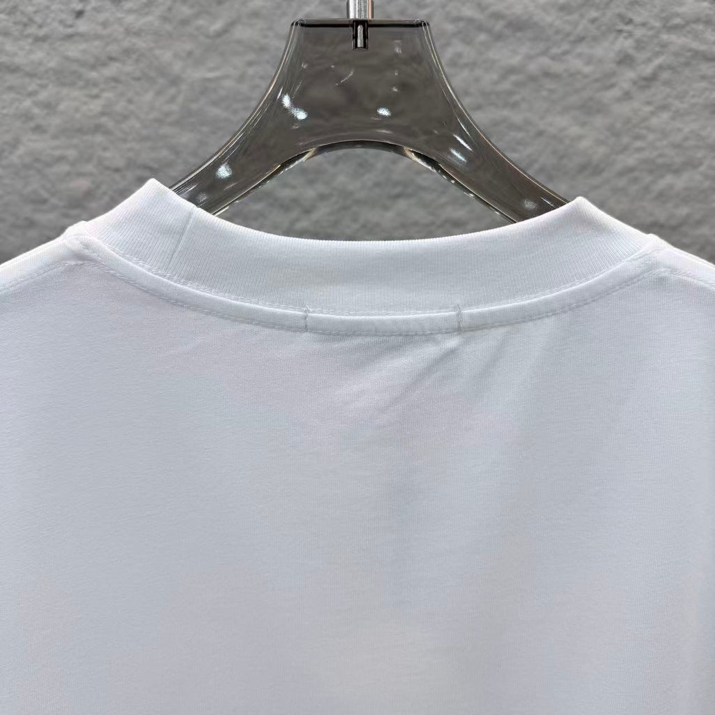 White Fendi short-sleeve T-shirt close-up of crew neck collar seam