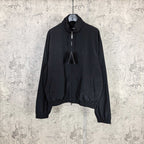 Black Balenciaga zip-up jacket with drawstring hood and elastic cuffs.