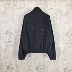 Black Balenciaga zip-up jacket with oval logo print on the back.