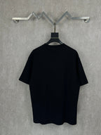 Balenciaga short-sleeve T-shirt in black, plain back view on hanger