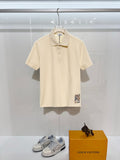 Burberry short-sleeve polo shirt in light cream, button placket and collar detail