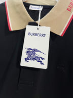 Burberry polo shirt collar detail with beige trim and red stripe; hanging brand tag