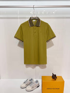 Short-sleeve polo shirt in olive green with button placket and contrast dark collar