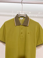 Short-sleeve polo shirt in olive green with pointed collar and button front