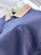 Dark blue Burberry polo shirt knit fabric with button placket and small logo