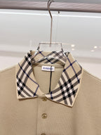 Beige polo shirt with checkered spread collar and button placket